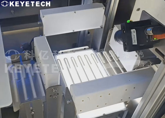 Machine d'inspection visuelle de la paille pour emballage en rouleau de boissons avec dispositif d'étiquetage