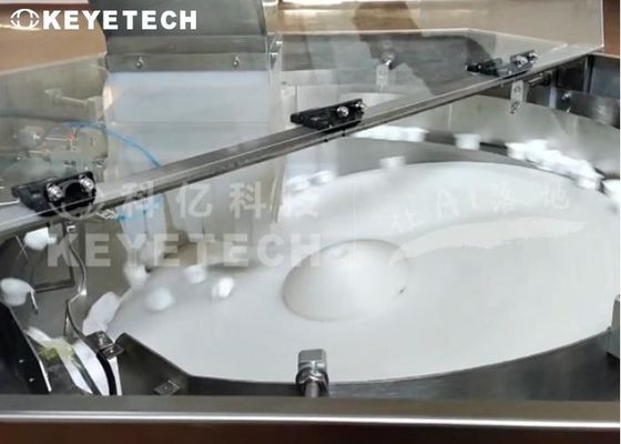 Système d'inspection visuelle automatique Helicap pour boissons lactées avec alimentateur vibrant